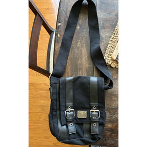 Kenneth Cole Reaction Black saddle bag purse